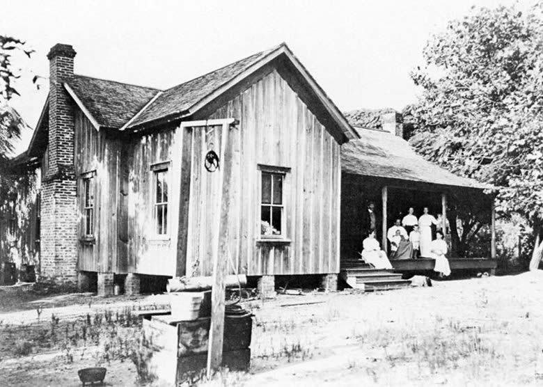 photo of a family and their house