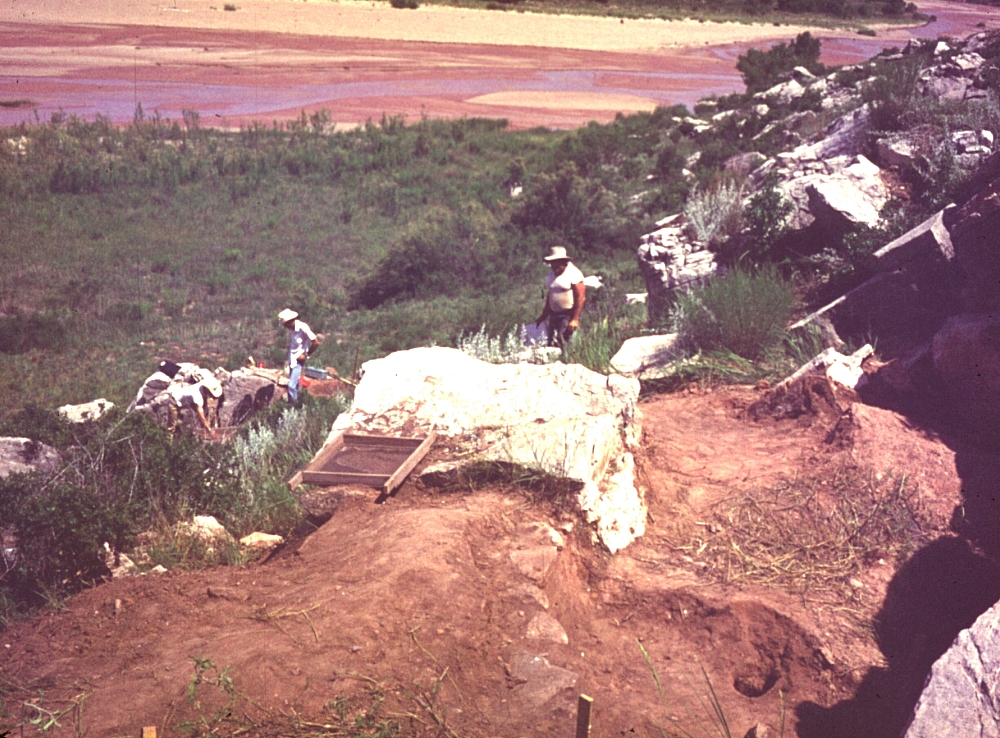 The Beaver Patrol working on the terrace slope above Blue Creek. The kids found lots of discarded Alibates tools and food remains among the rocks.