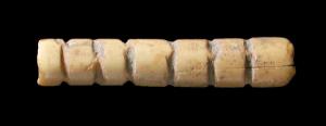 Incised bone bead from Arenosa. 