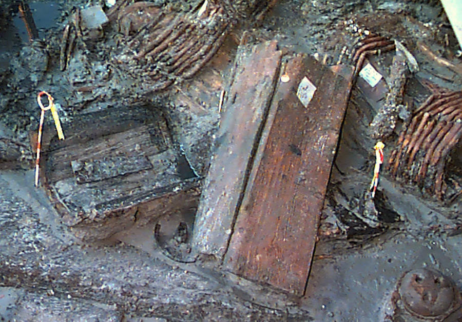 photo of wooden boxes filled with trade goods