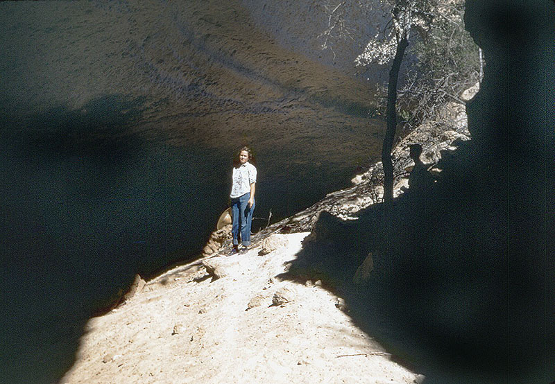 Wilmuth Skiles in Bonfire Shelter, 1953. This photograph was taken by Jack Skiles long before the archeological potential of "Ice Box Cave" was known.