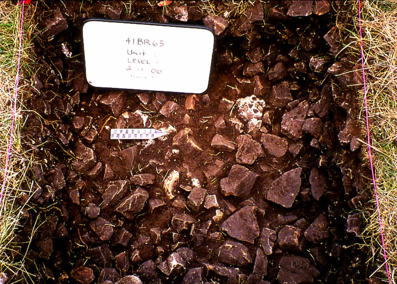 photo of a burned rock midden