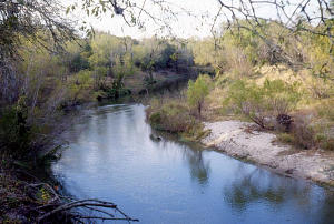 Closest gravel exposures occur along sharp bend of the river