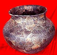 Playas Red Incised jar from Robledo Mountain Pueblo near Las Cruces. Playas Red was one of the most widely traded pottery types and is found from southeastern Arizona to Trans-Pecos Texas and from Truth or Consequences, New Mexico south to the Rio Conchos in Mexico.