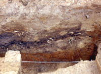 Remains of Civil War-era latrines, including this pit shown in the wall profile, were found during excavations. Photo by Steve Black.