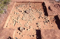 Remains of House 3 as exposed in excavation unit. Photo by Chuck Hixson.