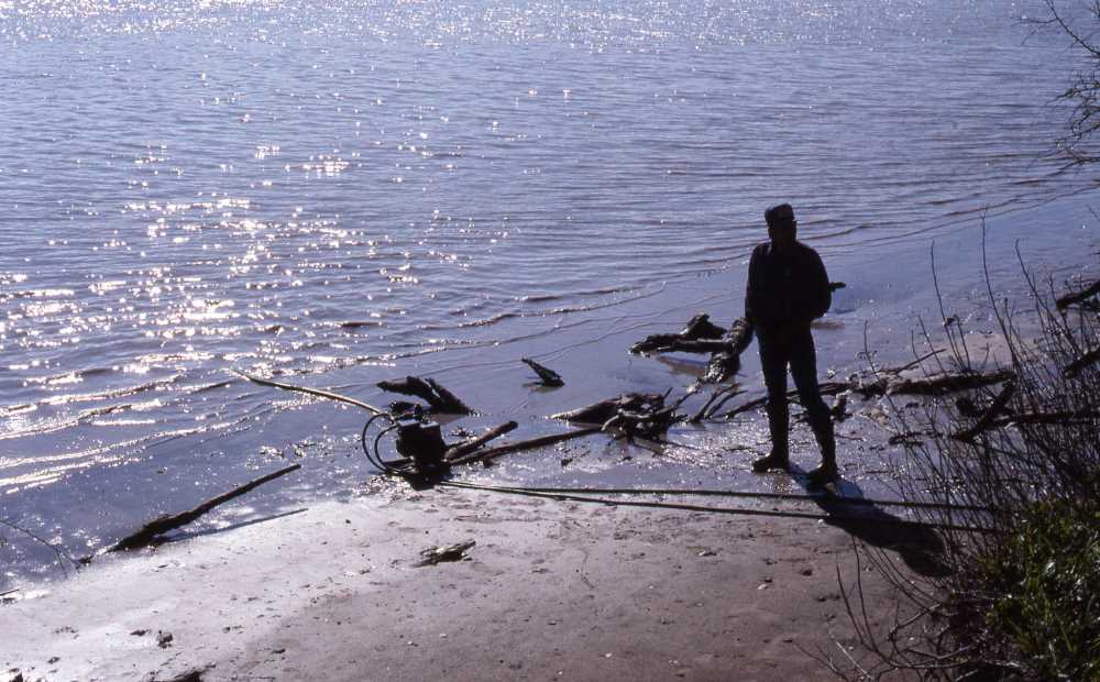 Image of crew members monitoring water pump.