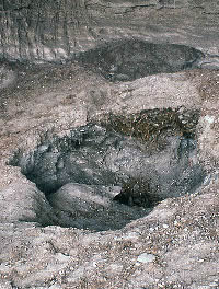 Photo of freshly dug looter hole