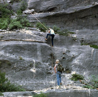 Person climbing up to Hinds Cave