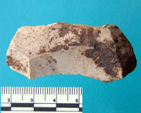 dirty stone flake tool