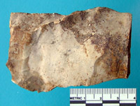 dirty stone flake tool