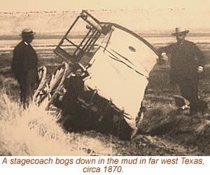 photo of a stagecoach stuck in the mud