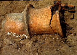 photo of early 18th-century copper candlestick recovered from the Old Socorro Mission