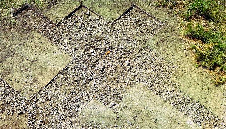 overhead photo of burned rock midden