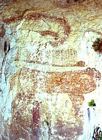 The Curly-Tailed Panther painted on the rear wall of an almost inaccessible rockshelter high on a cliff overlooking the Devils River. Photo by Steve Black.