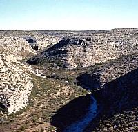 Innumerable canyons like this one provide shelter for plants, animals, and humans. Photo from ANRA-NPS Archives at TARL.