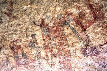 Pecos River style pictographs near the mouth of Rattlesnake Canyon, a side canyon of the Rio Grande. Photo by Steve Black.