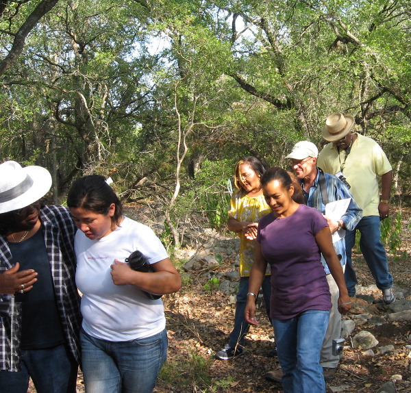 photo of the descendant community touring the Williams farmstead site with archeologists