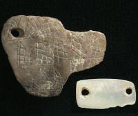 photo of ornamental pendants found at the Squawteat Peak site