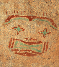 photo of a painted Jornada Mogollon face