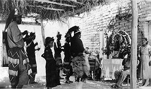 photograph collected by J. Charles Kelley labeled “Modern revival of Indian dance near San Vicente and Hot Springs, Texas on Rio Grande about 1937.” 