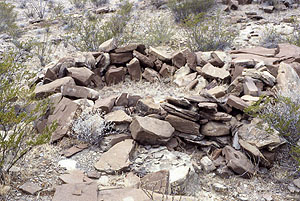 Artist's depiction of a cluster of La Junta pithouses