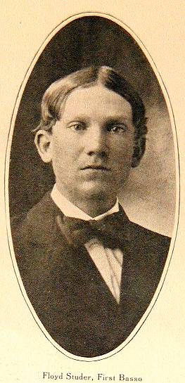 Old photo of teenage boy wearing bow tie. 