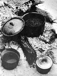 photo of pots of a wax maker's meal