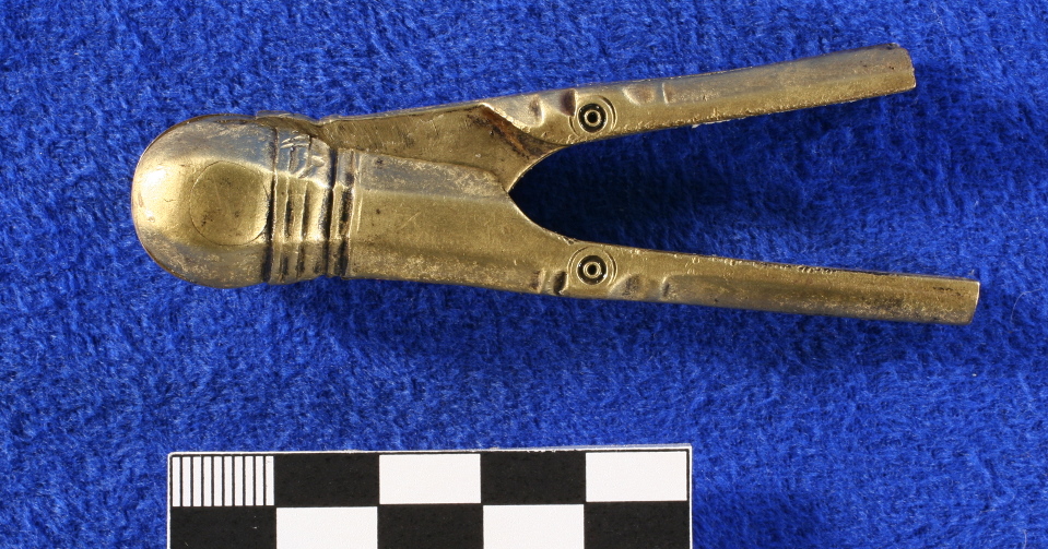 photo of a pair of brass dividers, with tips missing