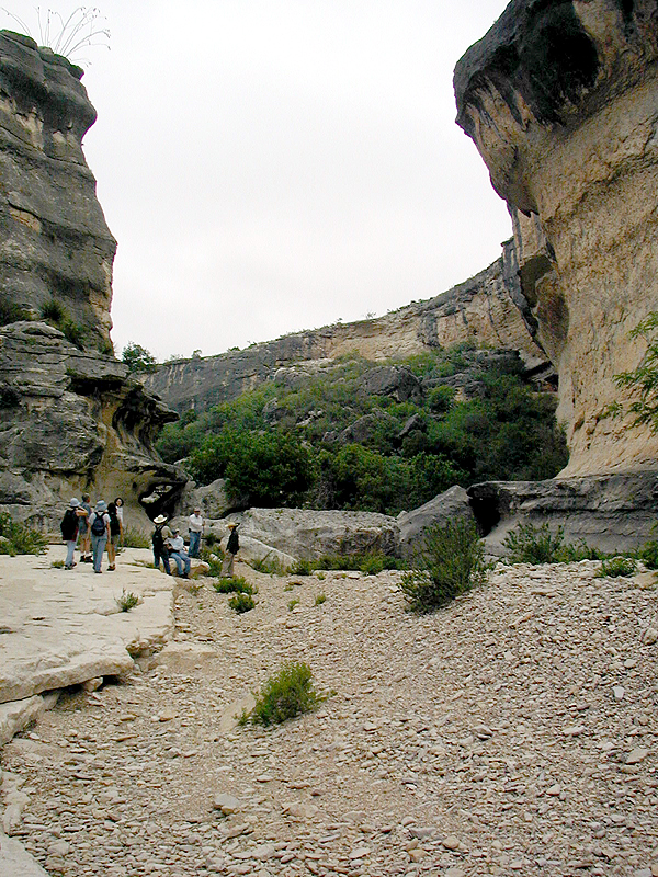 The group stops to rest below Bonfire Shelter. The shelter is just visible on the right.