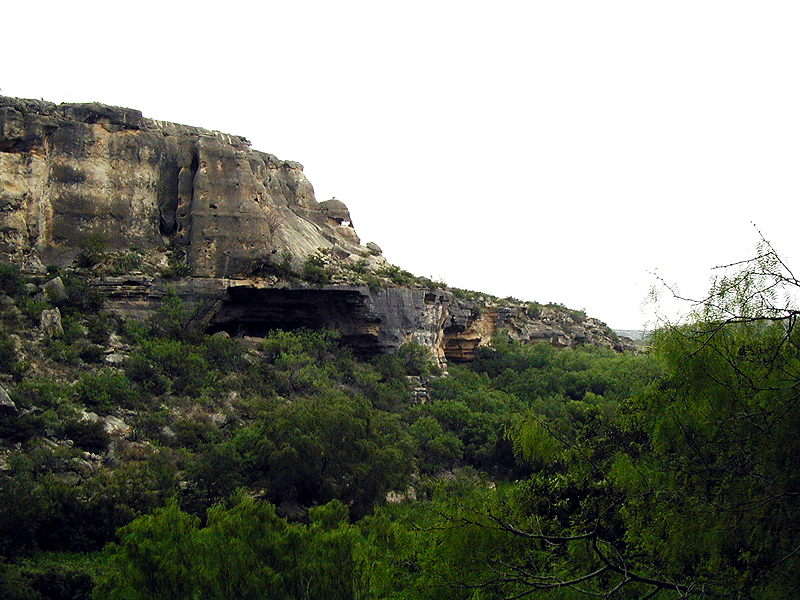 Our first destination is Kelly Cave, a modest-sized rockshelter visible in this photo as a dark hole.