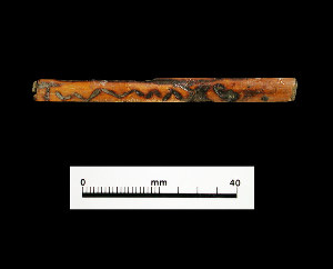 photo of decorated reed tube