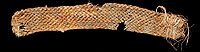 Woven band that was once part of a tumpline. Fiber or leather cords were attached to the ends of the band and used to secure carried burdens such as firewood bundles. The woven band was placed across the forehead, while the cords held the load secure on one's back. This very old carrying technique is still used today in rural areas of Mexico and Central America. From the ANRA-NPS collections at TARL.
