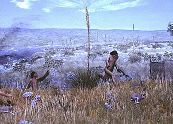 Rabbit-stick welding boys chase rabbits toward a net fence and a certain fate. Mural and diorama scene by artist Nola Davis, courtesy of Texas Parks and Wildlife Department. 