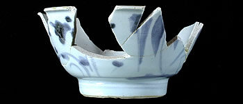 This Chinese porcelain rice bowl was found in one of the laborer camps along the Southern Pacific railroad within the Lower Pecos region. Chinese laborers were brought from California in the early 1880s to build the railroad that finally connected the west with the east portions of the railroad in 1884. An archeological study of one of the railroad worker camps found many artifacts connecting southwest Texas with China. Photo from ANRA-NPS Archives at TARL.