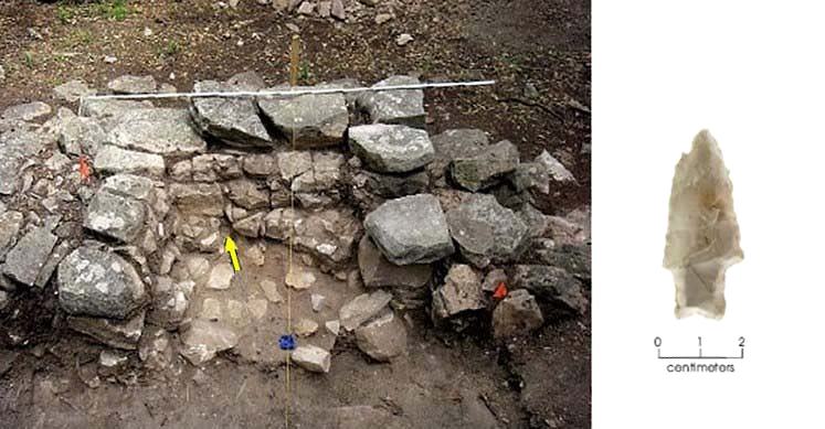 photo of the chimney feature and the nearly complete dart point found at the very bottom of fireplace