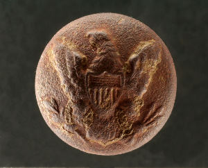 photo of an U.S. Army general service button, one of two found at the farm