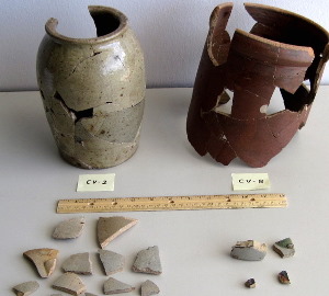 photo of four of the stoneware pots and sherd groups found at the Williams farmstead