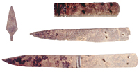 A metal arrow point (left) and knives used by the Indians at the Battle of Lyman's Wagon train.