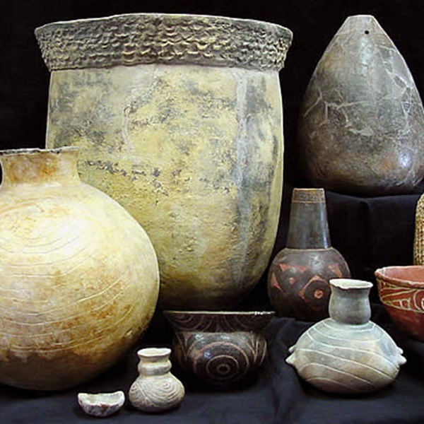 a photograph of a collection of clay pots