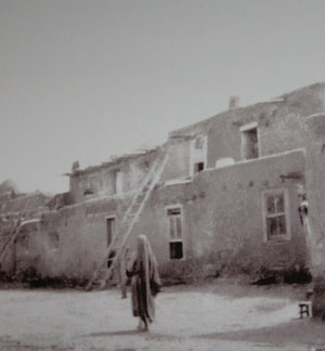 old photo of two-storied pueblo.